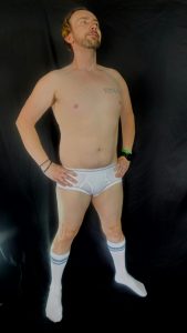 Joshua Marron in signature white briefs and skater socks