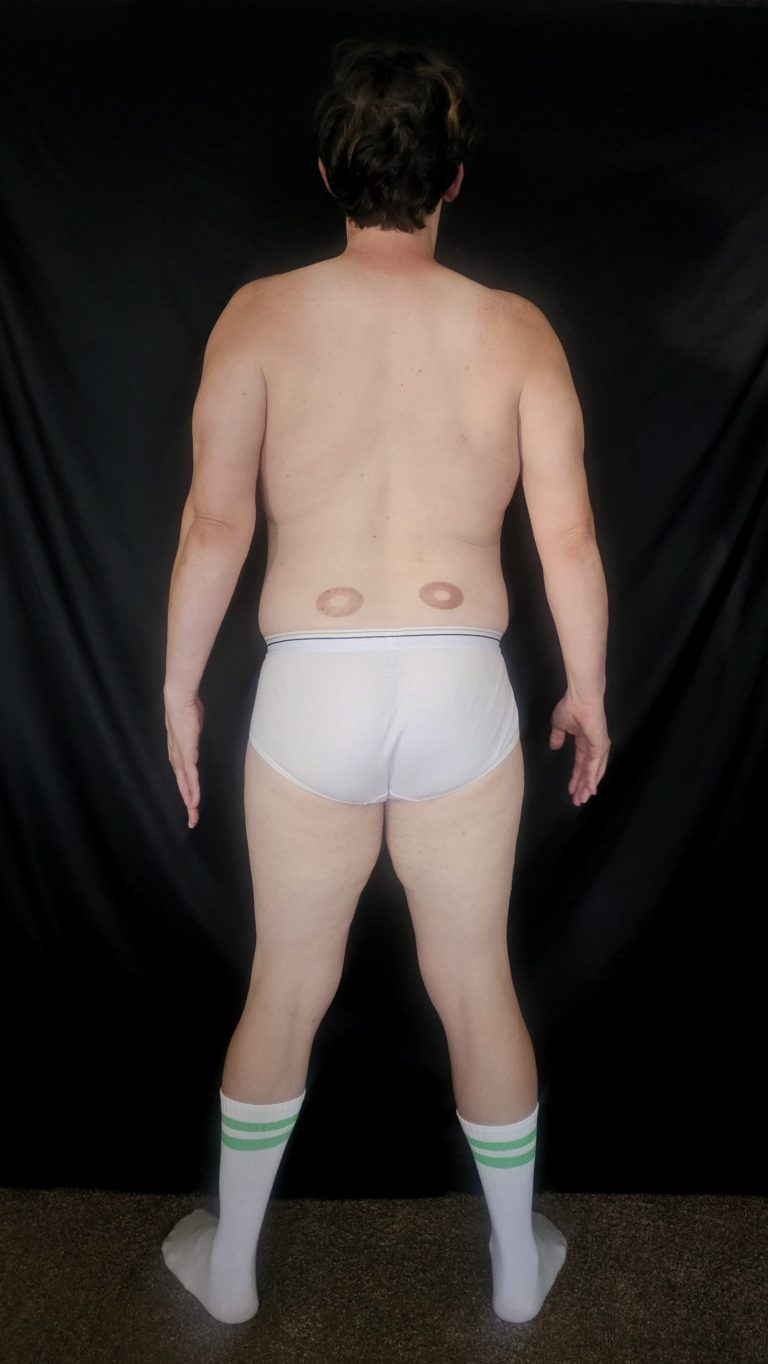 Joshua Marron rear view Week 4 Project Legacy progress photo in white briefs and socks.